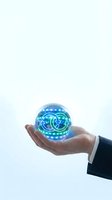 Hand holding glowing blue sphere with digital network circuit patterns and smiley faces, representing innovation, technology, artificial intelligence, and digital connectivity for business solutions.