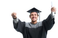 Excited young Hispanic male graduate in cap and gown celebrating academic achievement with diploma and raised fist against white background.