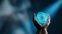 Hands protecting glowing blue brain hologram representing artificial intelligence, mental health care, neuroscience innovation and cognitive technology solutions.