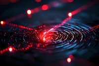 Glowing red circular ripples on dark background with light trails and bokeh effects create futuristic technological pattern for digital security concepts.