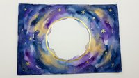 Watercolor galaxy frame with swirling blue, purple, and gold tones, glowing stars, and a white circular center for custom text or design.