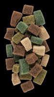 Scattered cleaning sponges in brown, green, and tan colors isolated on transparent background. Ready for design use on product packaging, clipart, stickers, and print-on-demand materials.