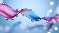 Liquid wave with water droplets flowing across blue and pink gradient background with bokeh light effects.