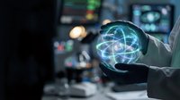 Scientist or researcher in business attire holding glowing atom model with orbital electrons, representing nuclear physics, quantum science, and technological innovation in laboratory setting.