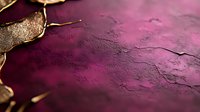 Luxurious purple and gold textured background with metallic leaf elements creates dramatic contrast and depth. Abstract artistic surface with rich burgundy tones.