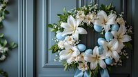 Easter wreath with white lilies, blue eggs, and delicate spring blossoms adorning gray door, creating seasonal home decoration for spring holidays.