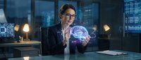 Young Caucasian businesswoman in glasses interacting with glowing holographic brain projection in dark high-tech office, exploring AI and neuroscience.
