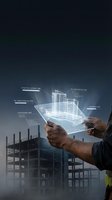 Construction worker using holographic building information modeling technology with digital blueprint projection for smart city development.