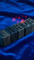 Wooden risk letters with glowing neon warning triangles on blue background, representing danger alerts, cybersecurity threats, and business risk management concepts.