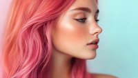 Young woman with vibrant pink hair in profile against turquoise background. Caucasian ethnicity, flawless complexion, natural makeup. Suitable for beauty, hair care, cosmetics, and fashion campaigns.