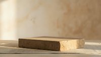 Minimalist wooden platform display stand on neutral beige background for product photography and branding presentations in natural lighting.