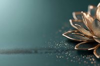 Metallic rose gold lotus flower with glitter sparkles on dark teal background, elegant minimalist composition for luxury branding and spiritual wellness designs.