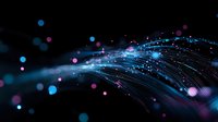 Glowing optical fibers with blue and pink bokeh lights flowing on black background create futuristic technology concept for digital communications.