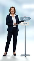 Professional businesswoman presenting future now directional signpost for career planning and strategic decision making in corporate environment.