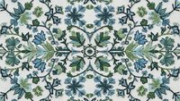 Vintage floral seamless pattern with blue and green botanical elements on cream background. Ornate decorative design tiles perfectly for wallpaper and textile.