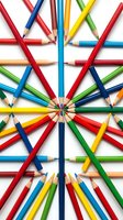 Colorful sharpened pencils arranged in a radial pattern converging at center point, featuring red, blue, yellow, green, and orange hues on white background for creative and educational concepts.
