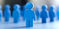Blue figure standing out from crowd against blurred background, leadership and individuality concept representing unique personality and distinction.