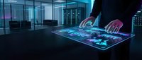 Professional businessman using interactive holographic touchscreen display with digital interface in modern corporate office environment for business analytics.