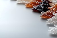 Frosted evergreen tree ornaments in copper, bronze, and white with crystalline sugar coating on isolated white background, ready for holiday design projects and seasonal marketing materials.