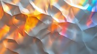 Shimmering metallic polygonal surface with orange and rainbow light reflections creating dynamic abstract pattern. Modern background for presentations.