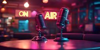 Retro microphones on table with glowing neon ON AIR sign in background, broadcasting studio atmosphere in pink and blue lights creating nostalgic radio mood.