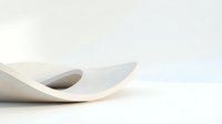 Modern white curved sculptural bowl with flowing organic design on clean minimalist background for contemporary home decor and product photography.