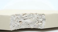 Broken white styrofoam insulation material showing porous texture and cellular structure for construction and building projects.