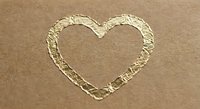 Heart shape drawn in wet sand on beach shore, romantic symbol for love and relationships, vacation memories and seaside romance concepts.