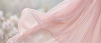 Soft pink flowing fabric with delicate folds and gentle waves, creating an ethereal, romantic aesthetic suitable for wedding, fashion, and lifestyle design projects.