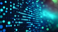 Glowing blue and turquoise dots forming digital pattern on dark background create futuristic technology visualization with bokeh light effect and depth of field.