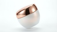 Luxury cosmetic cream jar with rose gold cap on white background for skincare and beauty product packaging design.
