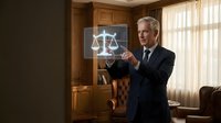 Senior Caucasian male lawyer in dark suit presenting digital justice scales hologram in traditional wood-paneled law office with leather furniture and warm lighting.