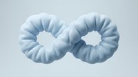 Light blue satin hair scrunchies pair isolated on white background for fashion accessories and hair styling products.