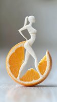 Creative food art featuring white powdered female silhouette gracefully posed on fresh orange slice segments against light background, wellness concept.