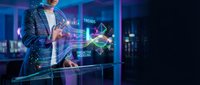 Professional businessman analyzing holographic data visualization and financial trends in modern office environment for business intelligence applications.