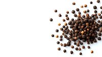 Black peppercorns scattered on white background, aromatic whole spices isolated with natural shadows, ready for culinary and design projects.