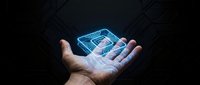 Futuristic holographic CPU processor chip floating above open palm against dark background. Digital technology concept for computing and electronics design.