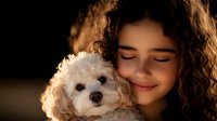 Young Hispanic woman with curly hair embracing small white fluffy dog in warm sunset lighting, expressing joy and companionship in intimate portrait.