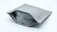 Gray metallic foil pouch packaging isolated on white background for food storage, shipping and commercial product design applications.