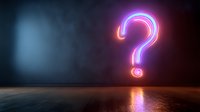 Glowing neon question mark on dark background with reflection on floor surface creates mysterious atmosphere for concept designs and presentations.