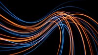 Glowing neon light trails in orange and blue flowing across dark background, creating dynamic wave patterns for modern design and technology concepts.