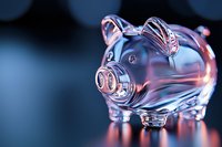 Glass piggy bank with pink and blue reflections on dark background, symbolizing financial savings and investment concepts for banking and wealth management.
