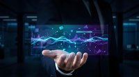 Businessman holding glowing digital hologram with data analytics charts and graphs, representing financial technology, business intelligence, and data visualization for corporate presentations.