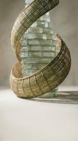 Contemporary wicker basket sculpture with glass brick wall creating artistic interplay of natural materials and modern architecture in minimalist interior space.