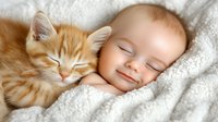 Peaceful sleeping baby and ginger kitten cuddling together on soft white blanket, capturing tender moment of childhood companionship and innocent slumber.