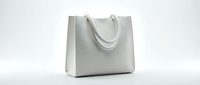 Elegant white leather tote bag with structured silhouette and double handles, isolated on white background, for fashion and retail design use.