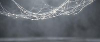 Glowing network of connected nodes and lines floating above a dark gray surface, representing digital technology, data flow, and neural connections.