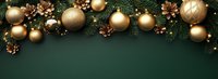 Golden Christmas ornaments and natural pine cones create elegant border with evergreen branches on dark green background, festive holiday composition.