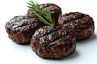 Grilled beef patties with herb garnish on white background, isolated for culinary design and restaurant menu applications.