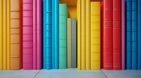 Row of colorful book spines standing upright on shelf, featuring vibrant rainbow spectrum from orange to pink, turquoise, yellow and blue, creating modern minimal composition.